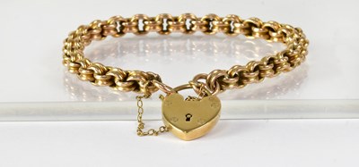 Lot 867 - A 9ct yellow gold double belcher link bracelet...