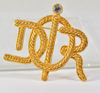 Lot 878 - CHRISTIAN DIOR; a gold-coloured ropetwist...