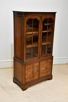 Lot 39 - A reproduction display cabinet, with pair of...