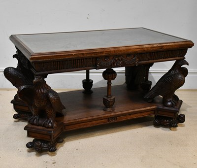 Lot 1 - A reproduction carved and stained hardwood...