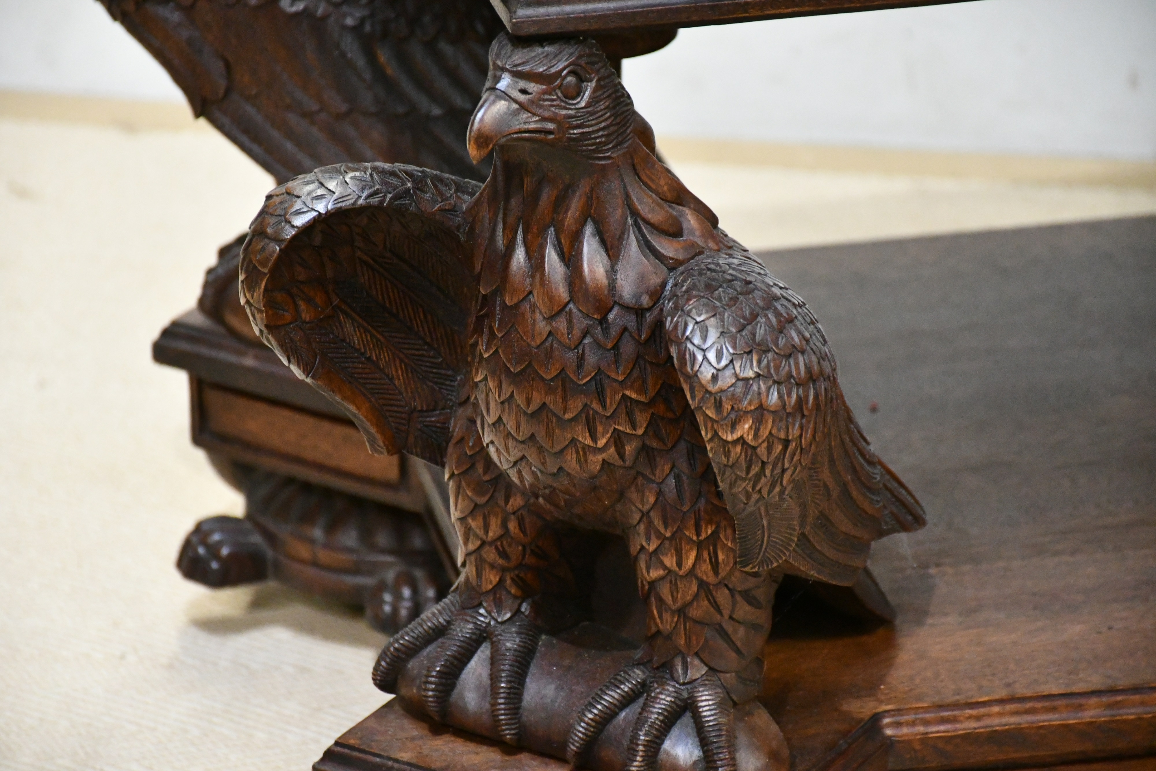 Lot 1 A reproduction carved and stained hardwood