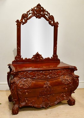 Lot 4 - A modern carved and stained hardwood...