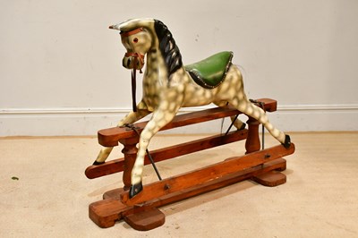 Lot 962 - A vintage painted rocking horse on pine stand,...