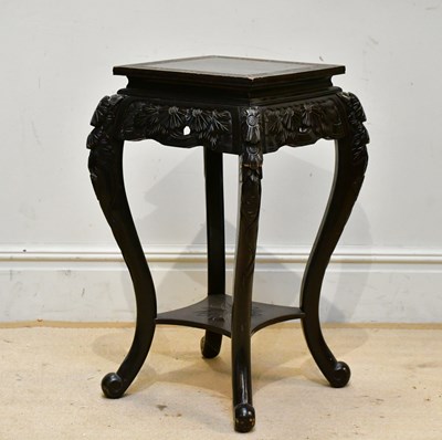 Lot 174 - A Chinese ebonised jardinière stand, height 77cm.