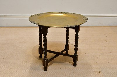 Lot 1361 - A folding barley twist occasional table with...