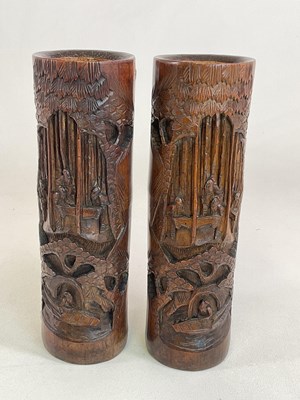 Lot 384 - A pair of bamboo brush pots with carved...