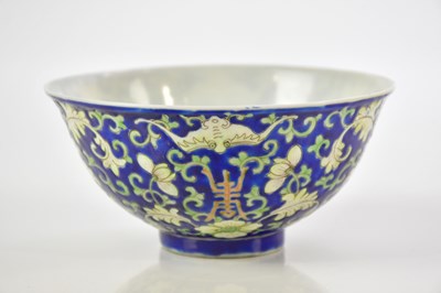 Lot 1045 - A Chinese porcelain blue ground lotus bowl,...