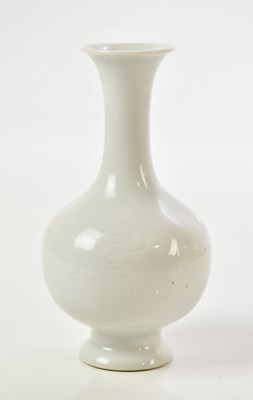 Lot 1006 - A Chinese porcelain Dehua vase, with an hua...