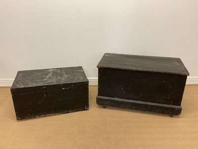 Lot 828 - Two black painted pine trunks with metal...