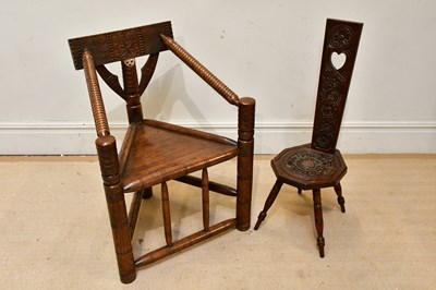 Lot 128 - A carved oak turner's chair with triangular...