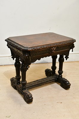 Lot 175 - A Victorian carved oak side table with lion...