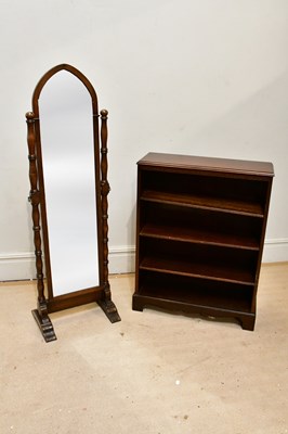 Lot 29 - A reproduction Gothic style oak cheval mirror...