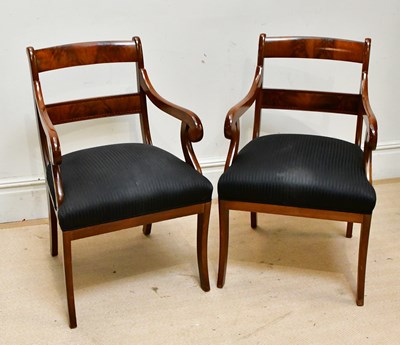 Lot 169 - A pair of Georgian open sided elbow chairs...