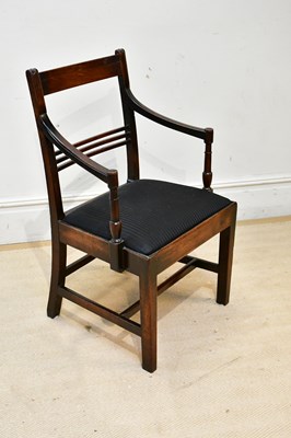 Lot 211 - A 19th century mahogany open sided elbow chair...