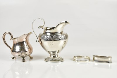 Lot 364 - A Continental silver cream jug, with weighted...