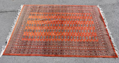 Lot 299 - A large Eastern style Bokhara type rug, with...