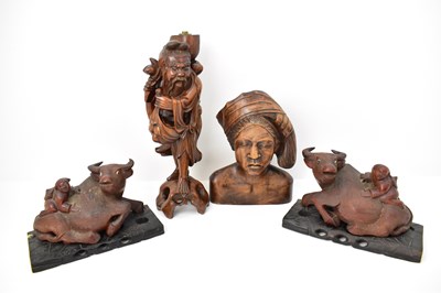 Lot 277 - A Japanese carved wooden figure, possibly of a...