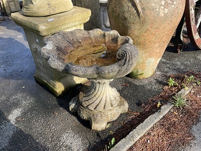 Lot 287 - A reconstituted stone bird bath, with shell...