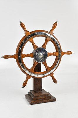 Lot 1257 - MARITIME INTEREST; a model of a ship's wheel,...