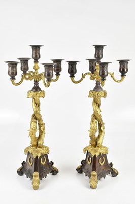 Lot 371 - A pair of reproduction gilt and bronzed metal...