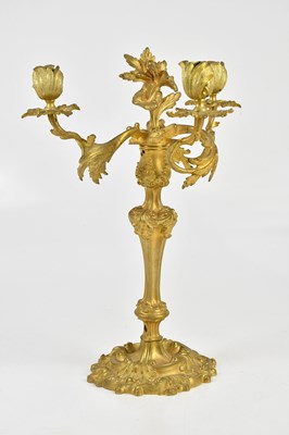 Lot 1333 - A 19th century ormolu three branch candelabrum...