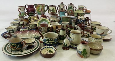 Lot 308 - DEVON POTTERY; a large quantity of cream...