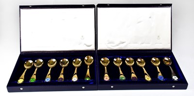 Lot 731 - GEORG JENSEN; two cased sets of six silver...