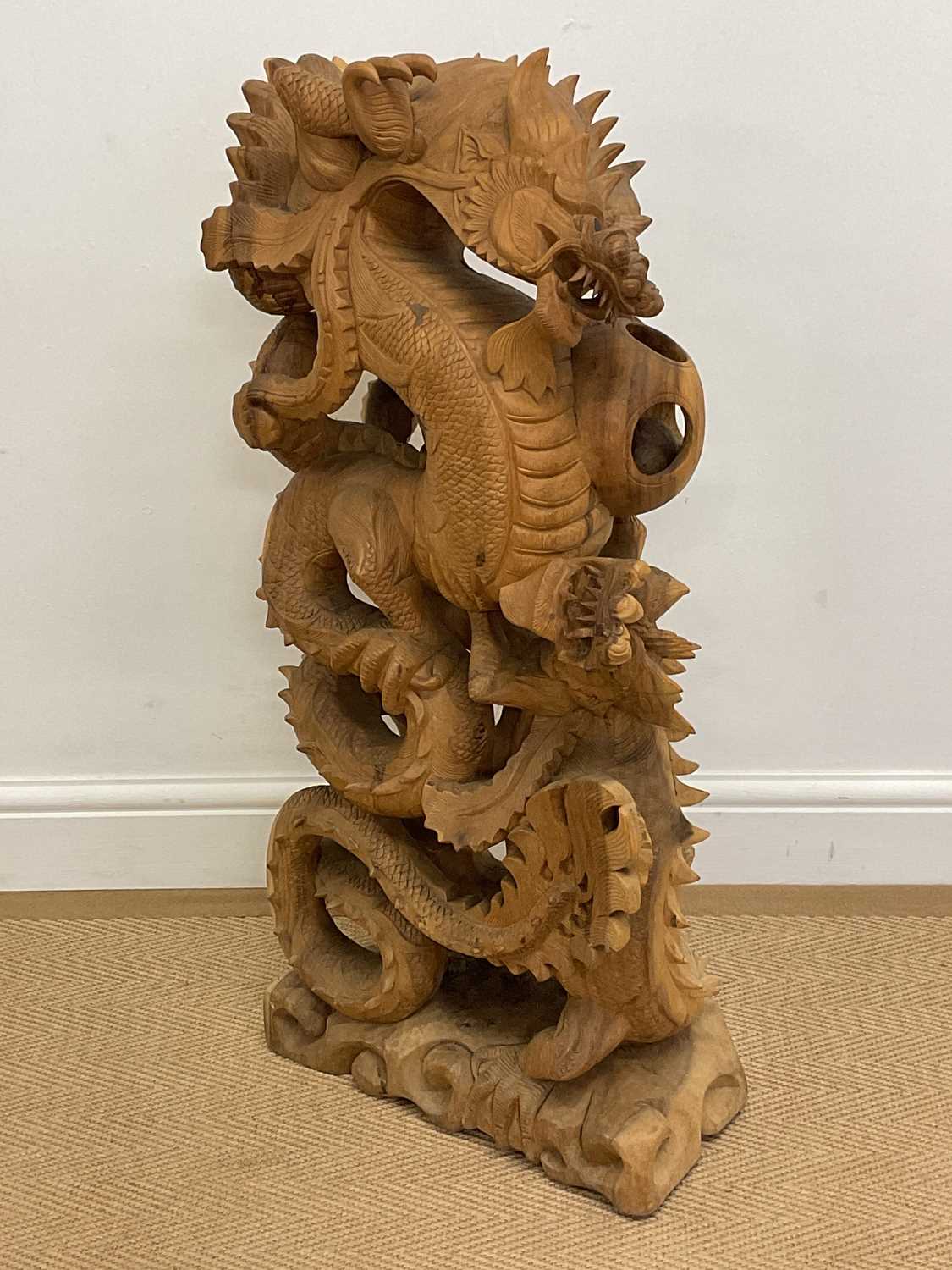 Lot 367 - Chinese hand carved fighting dragons, height...