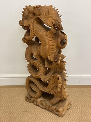 Lot 367 - Chinese hand carved fighting dragons, height...