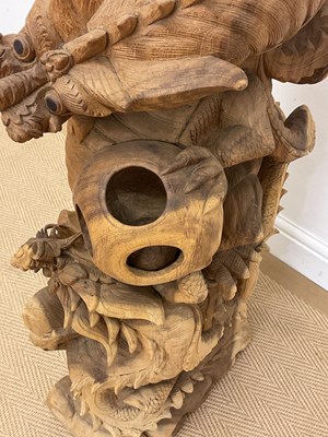 Lot 367 - Chinese hand carved fighting dragons, height...