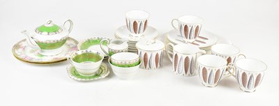 Lot 509 - SUSIE COOPER; a 'Hyde Park' part tea set...