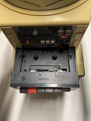 Lot 174 - TOMY; an Omnibot robot and one other, taller...