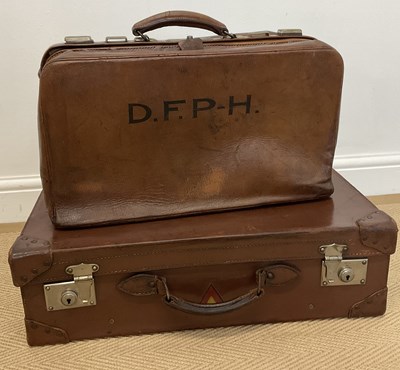 Lot 48 - A brown leather suitcase, height 36cm, width...