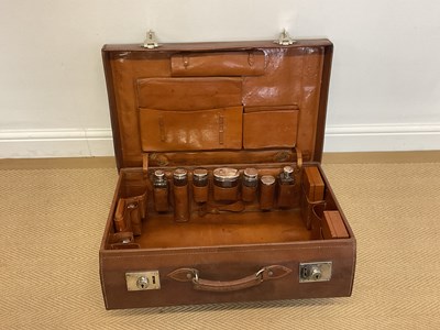 Lot 25 - A tan peccary leather suitcase stamped Mappin...