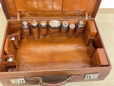 Lot 25 - A tan peccary leather suitcase stamped Mappin...