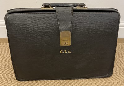 Lot 51 - A black leather brief case embossed C.I.A in...