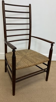 Lot 810 - An Arts and Crafts low ladder back chair with...