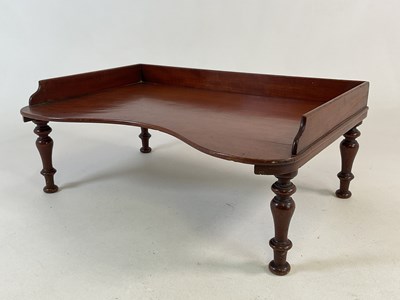 Lot 824 - An early 20th century mahogany bed tray on...