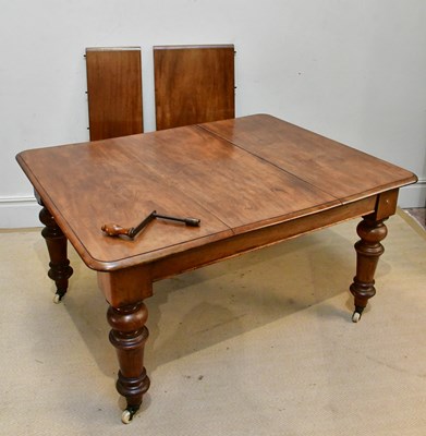 Lot 104 - A Victorian mahogany wind-out extending dining...