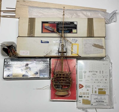 Lot 183 - BLUE JACKET; a large wooden model kit to build...