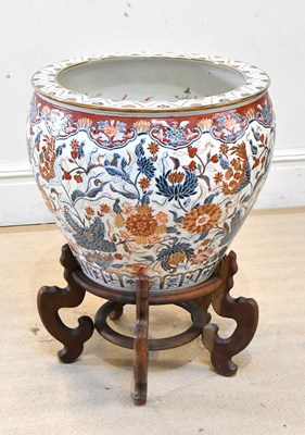 Lot 1087 - A large 20th century Chinese fish bowl on...