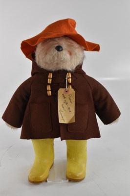 Lot 986 - A vintage Paddington Bear with orange hat,...