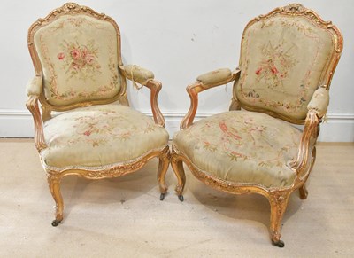 Lot 93 - A pair of Louis XV style gilt wood fauteuils,...