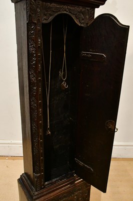 Lot 308 - COURTER, RUTHIN; a 19th century carved oak...
