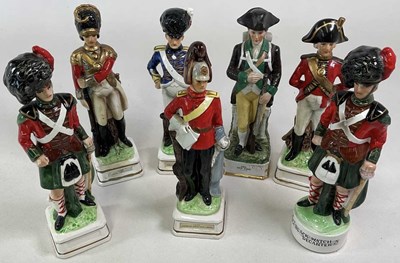 Lot 96 - A group of seven ceramic military figural...