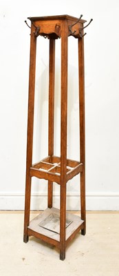 Lot 134 - An Edwardian oak coat and umbrella stand, of...