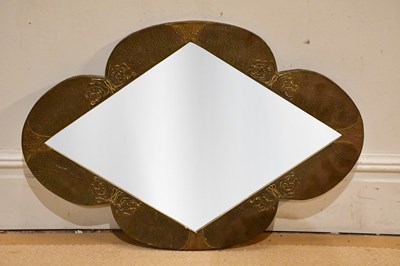 Lot 64 - An Arts and Crafts style brass wall mirror, of...