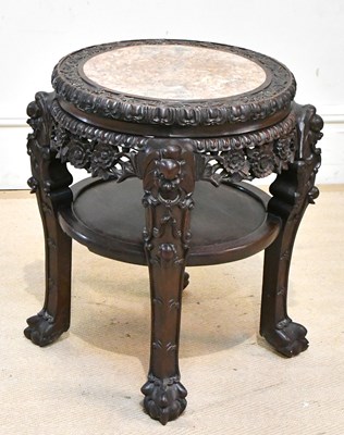 Lot 1038 - A Chinese carved rosewood two tier jardinière...