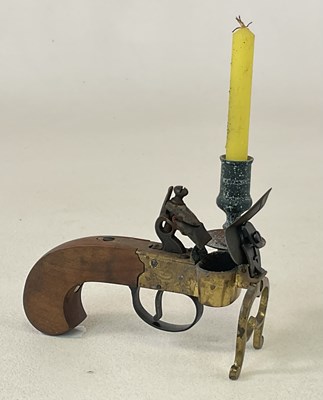 Lot 100 - A 20th century tinderbox with flintlock...