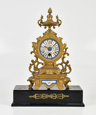 Lot 328 - An early 20th century gilt metal mantel clock,...